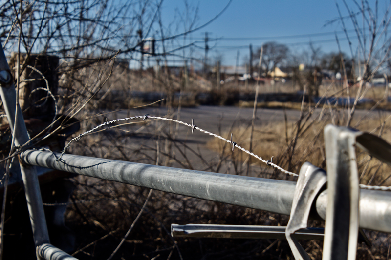 Barbed wire that now lines the property at Longhorn.